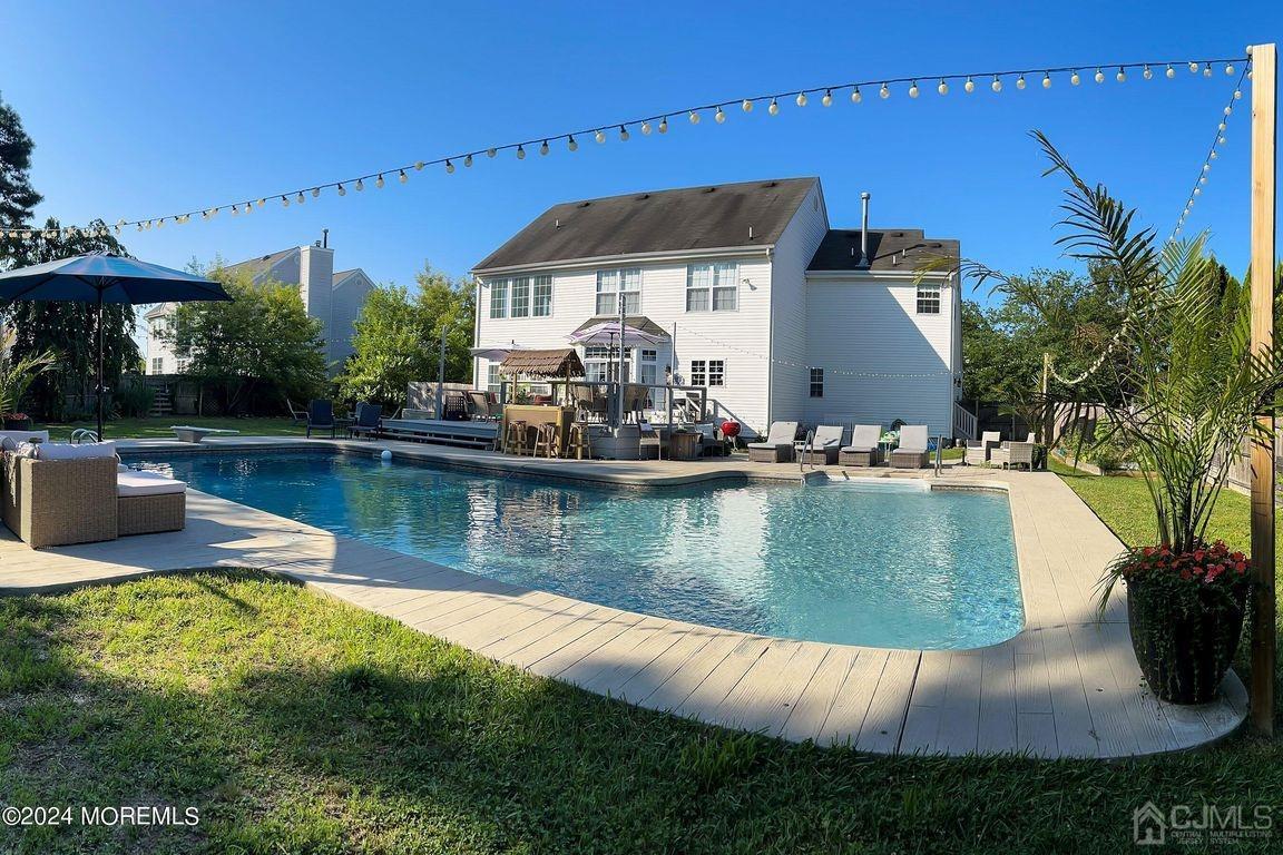 8 Williams Street Barnegat, NJ 08005 - Photo 54 of 64 a view of a house with a yard and sitting area