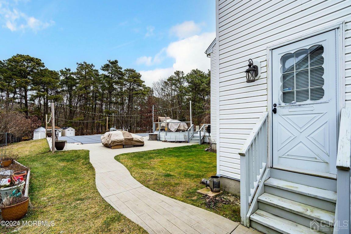 8 Williams Street Barnegat, NJ 08005 - Photo 56 of 64 a view of a swimming pool with furniture