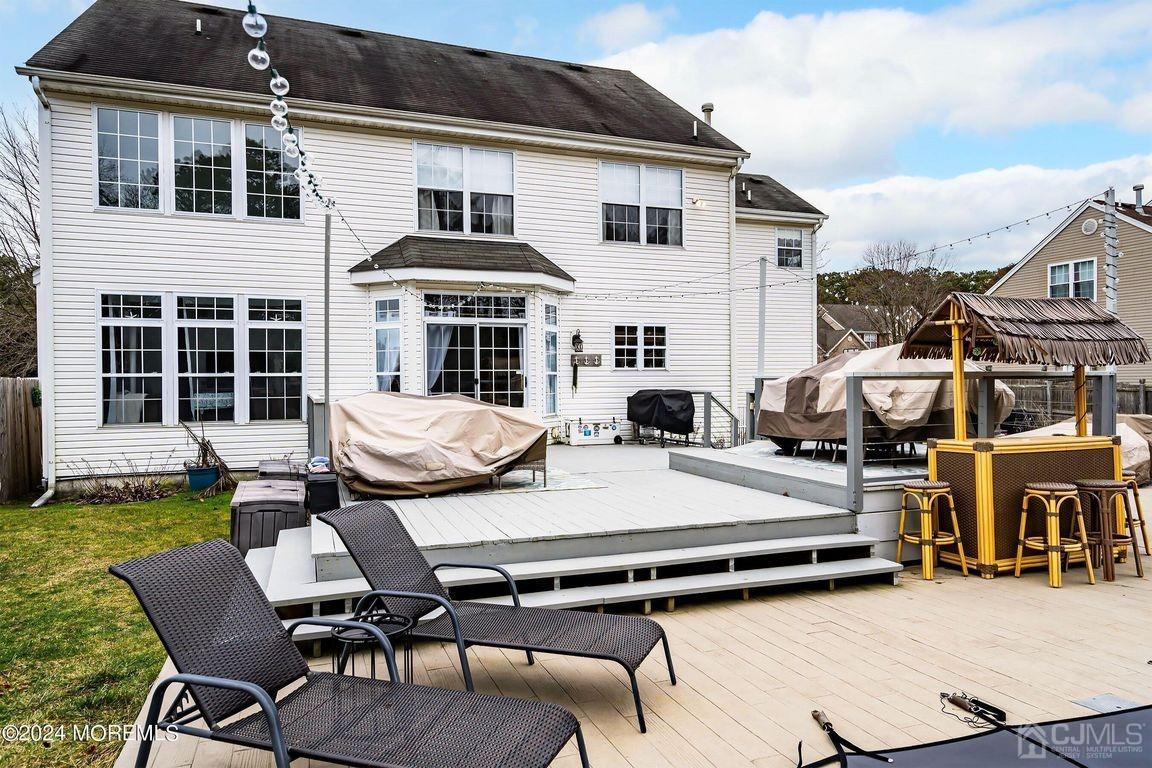 8 Williams Street Barnegat, NJ 08005 - Photo 57 of 64 a view of a patio with table and chairs