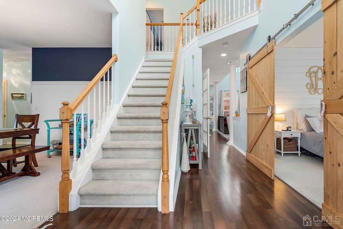 8 Williams Street Barnegat, NJ 08005 - Photo 7 of 64 a view of entryway and hall with wooden floor