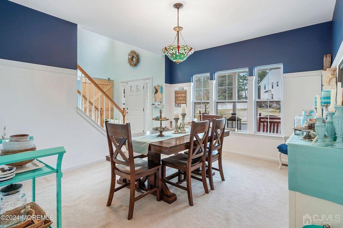 8 Williams Street Barnegat, NJ 08005 - Photo 8 of 64 a view of a dining room with furniture and a chandelier