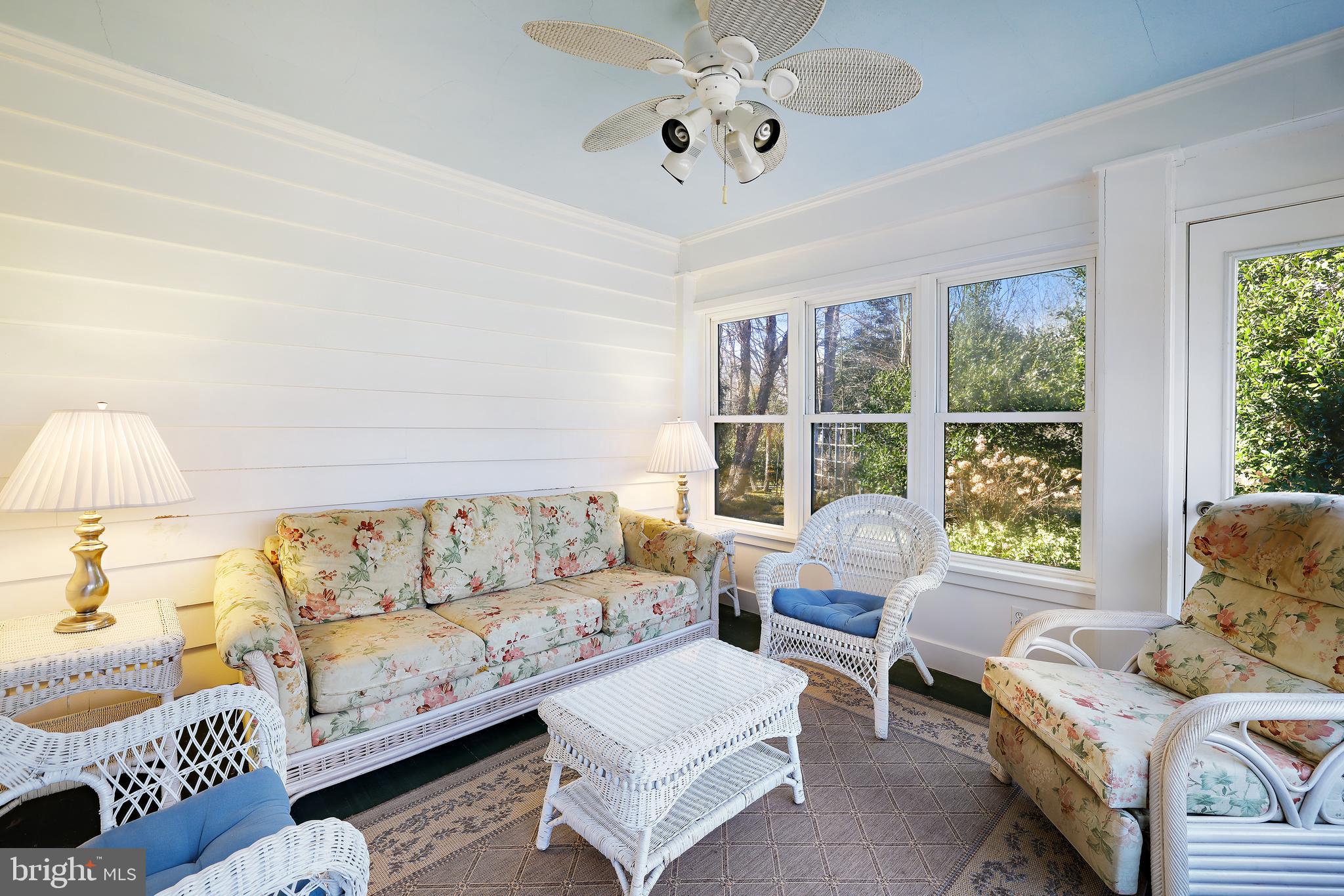 3330 Solomons Island Road Edgewater, MD 21037 - Photo 13 of 32 Sunroom with original wood siding...gorgeous.