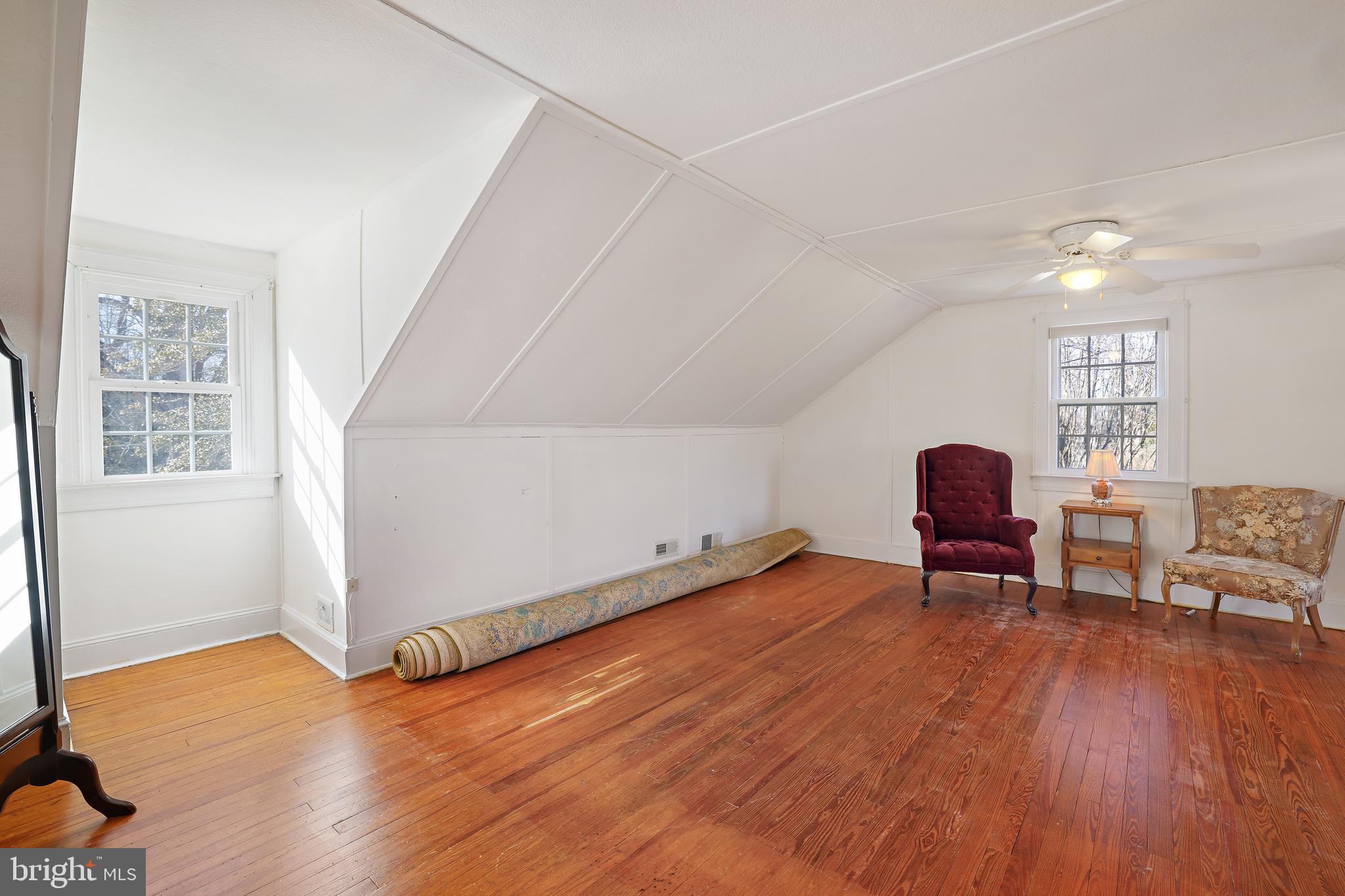 3330 Solomons Island Road Edgewater, MD 21037 - Photo 21 of 32 Beautiful oak hardwoods 2nd Floor Primary Bedroom