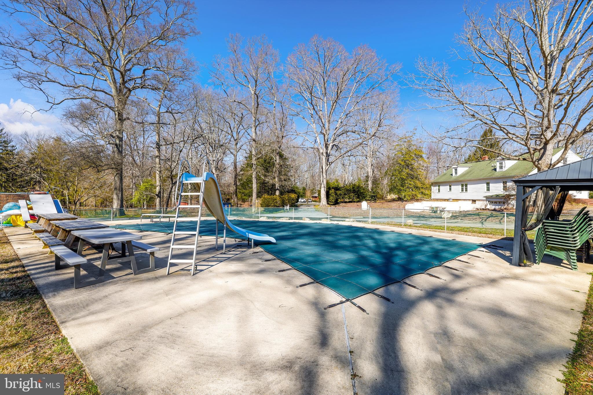 3330 Solomons Island Road Edgewater, MD 21037 - Photo 29 of 32 In-ground concrete pool; 10' max. depth.