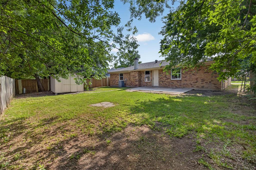 7528 Meadowlark Lane North Watauga, TX 76148 - Photo 27 of 31 a view of a house with a yard