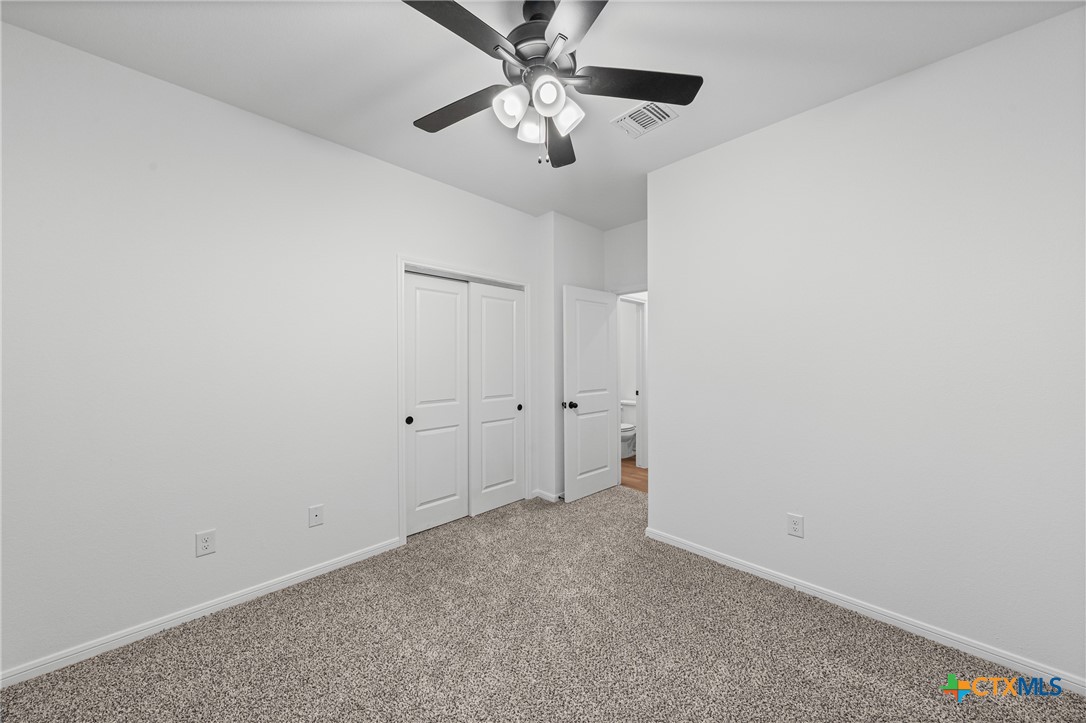 8011 Pineridge Way Temple, TX 76502 - Photo 19 of 32 a view of a chandelier fan in a room