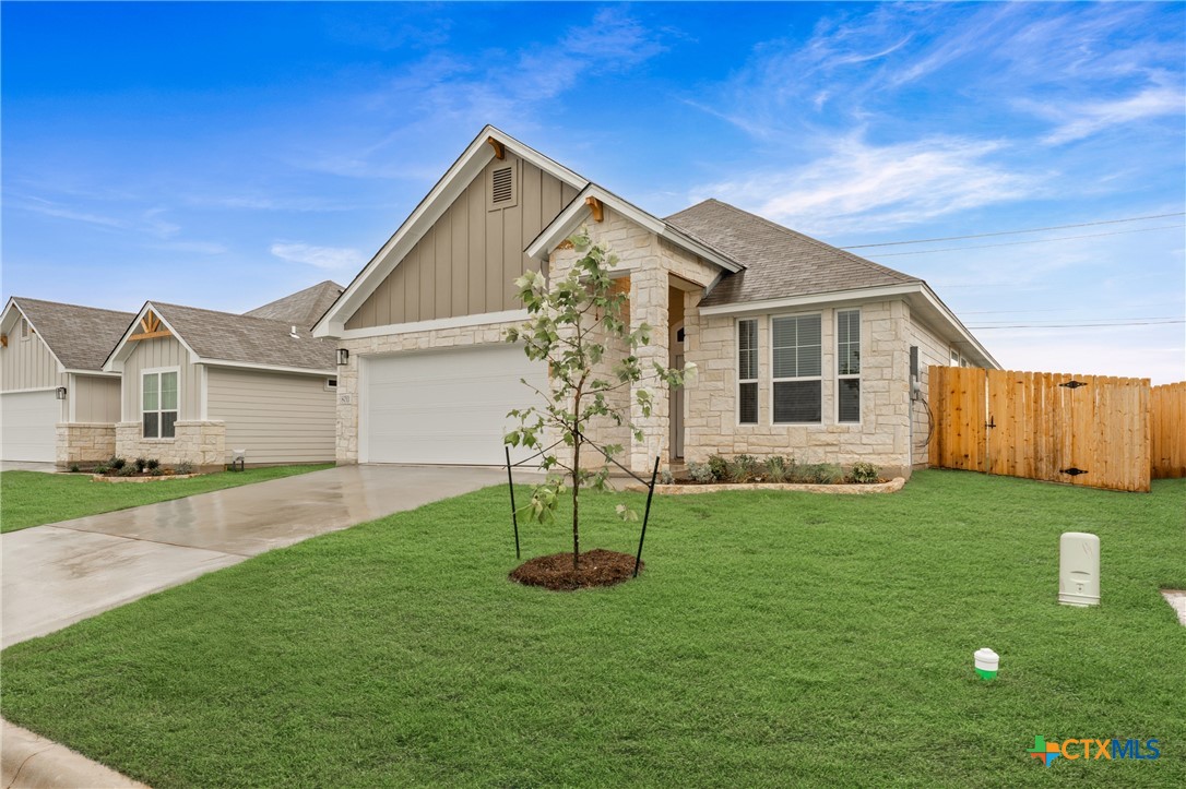 8011 Pineridge Way Temple, TX 76502 - Photo 3 of 32 a front view of a house with a yard