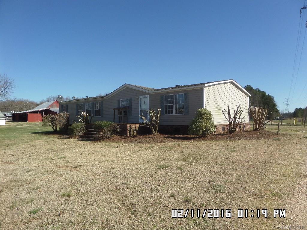 8480 Smith Road Kannapolis, NC 28081 - Photo 1 of 11 a view of a house with a yard
