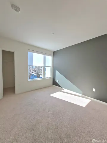 a bathroom with a double vanity sink toilet and shower