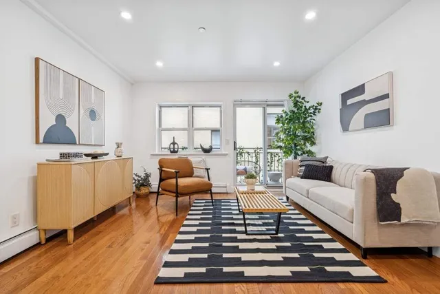 a picture of a wall with a white building