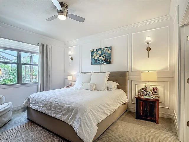 a view of a tables and chairs under an umbrella
