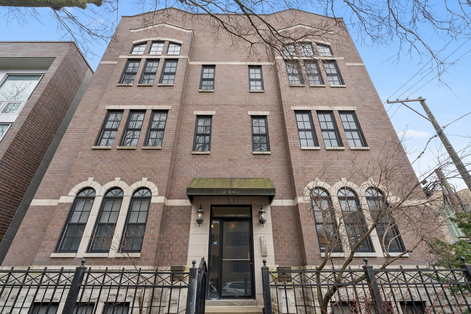 2147 West Rice Street, Unit 1W Chicago, IL 60622 - Photo 1 of 27 front view of a building
