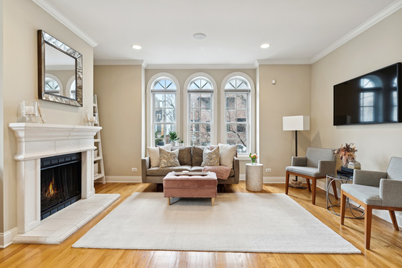 2147 West Rice Street, Unit 1W Chicago, IL 60622 - Photo 2 of 27 a living room with furniture and a fireplace