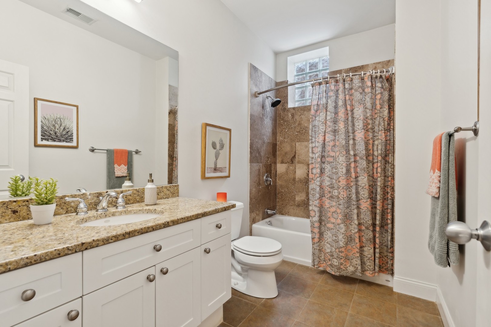 2147 West Rice Street, Unit 1W Chicago, IL 60622 - Photo 22 of 27 a bathroom with a granite countertop sink toilet and shower