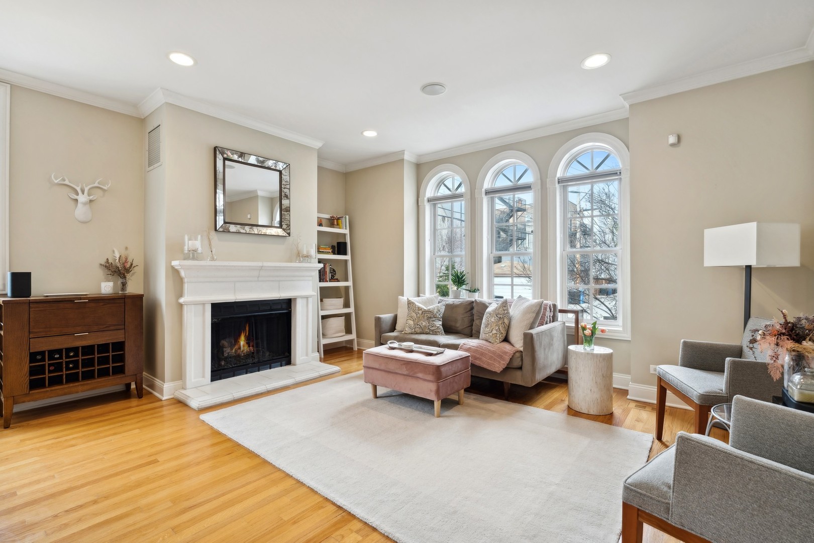 2147 West Rice Street, Unit 1W Chicago, IL 60622 - Photo 3 of 27 a living room with furniture and a fireplace