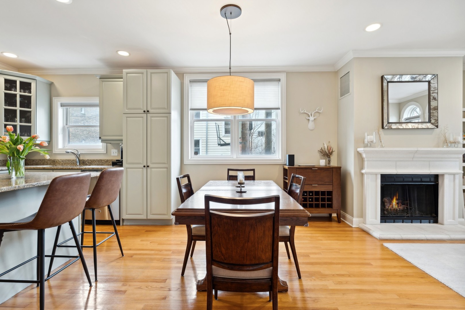 2147 West Rice Street, Unit 1W Chicago, IL 60622 - Photo 8 of 27 a dining room with furniture window and wooden floor