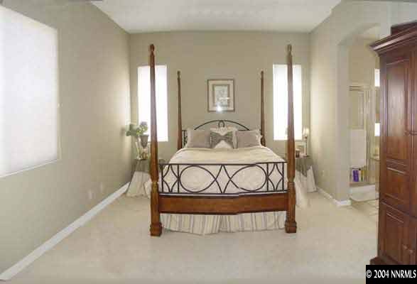 1601 Dutch Ravine Court Reno, NV 89521 - Photo 5 of 9 a bedroom with a bed and window
