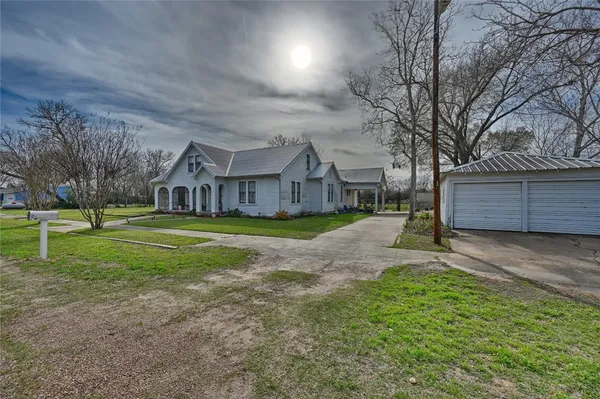 a view of house with outdoor space