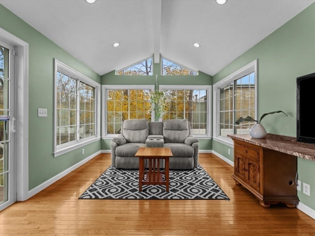 11 Benson Street Worcester, MA 01604 - Photo 13 of 40 a living room with furniture and a large window