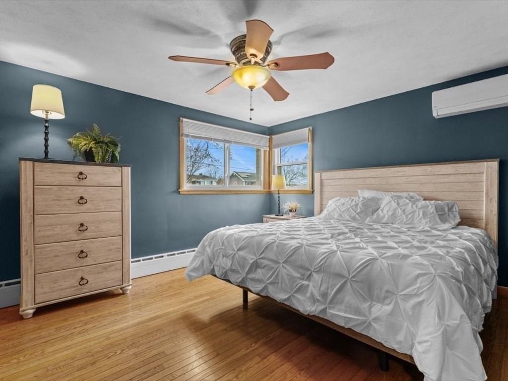 11 Benson Street Worcester, MA 01604 - Photo 18 of 40 a bedroom with a bed and window