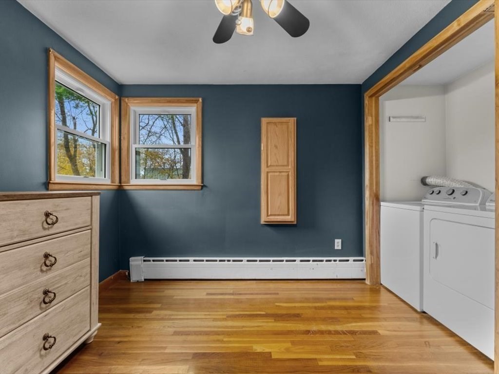 11 Benson Street Worcester, MA 01604 - Photo 21 of 40 a view of an empty room with window and cabinet