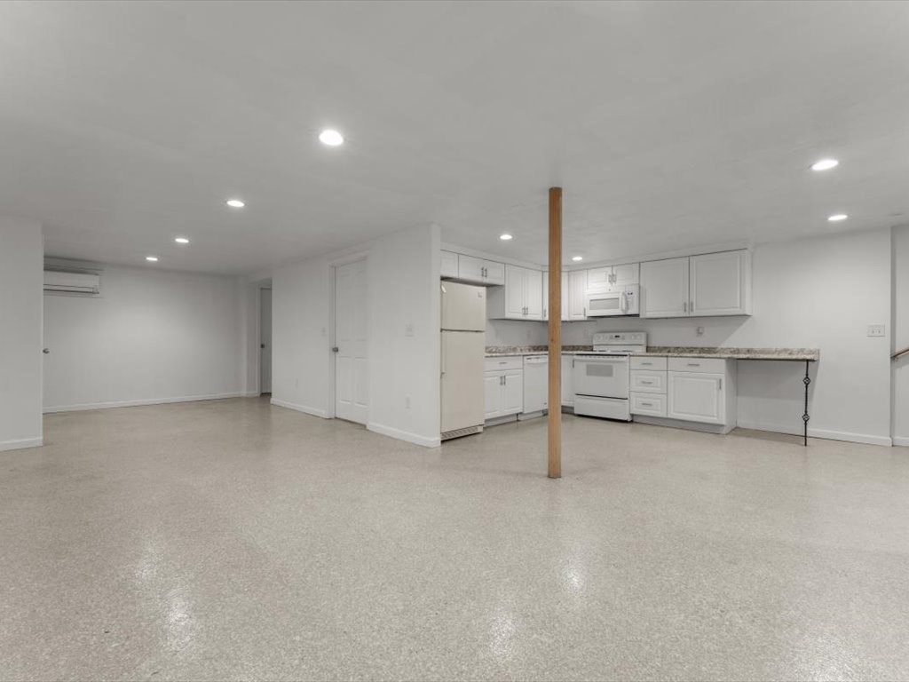 11 Benson Street Worcester, MA 01604 - Photo 25 of 40 a view of kitchen with white cabinets and outdoor space
