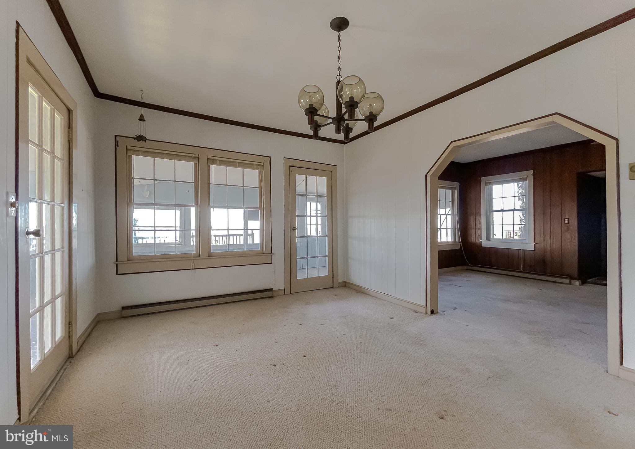 18111 River Road Tall Timbers, MD 20690 - Photo 9 of 39 Dining Room with view of the River