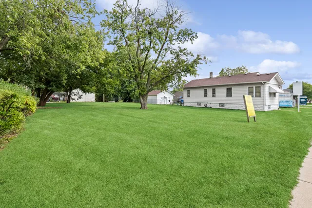 a view of a house with a big yard