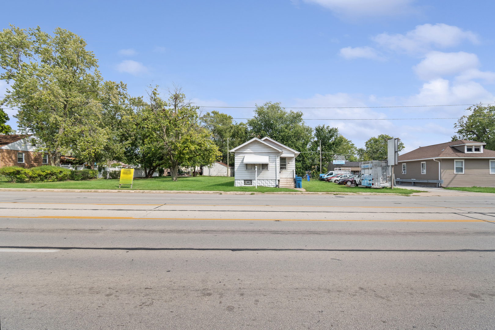 3117 Chicago Road Steger, IL 60475 - Photo 22 of 23 a front view of a house with a garden