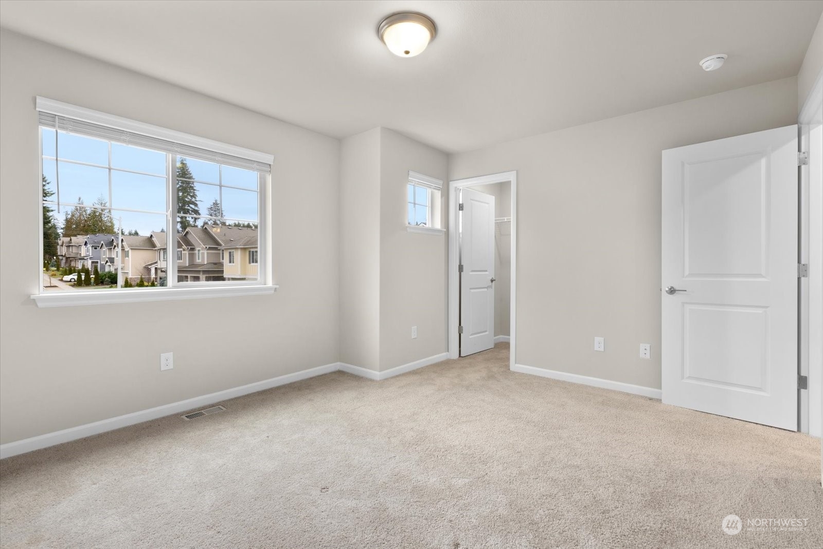 4308 233rd Place Southeast Bothell, WA 98021 - Photo 13 of 39 a view of an empty room with a window