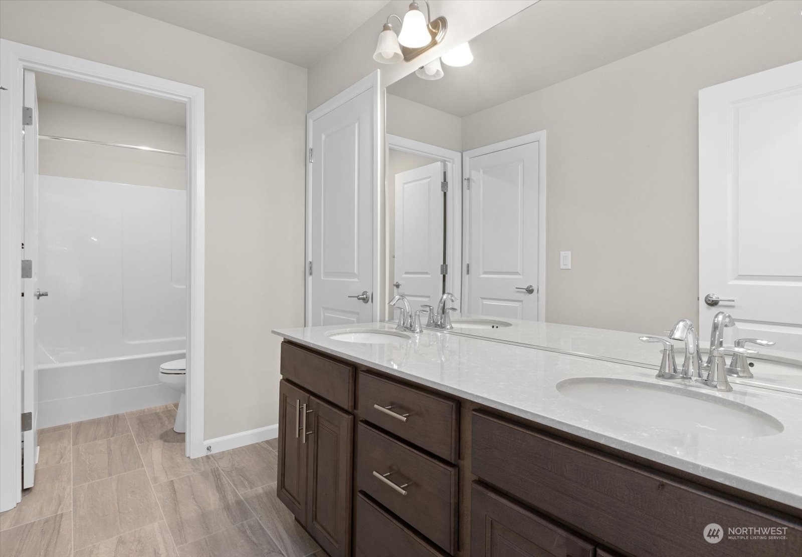 4308 233rd Place Southeast Bothell, WA 98021 - Photo 17 of 39 a bathroom with a sink double vanity granite tub and shower