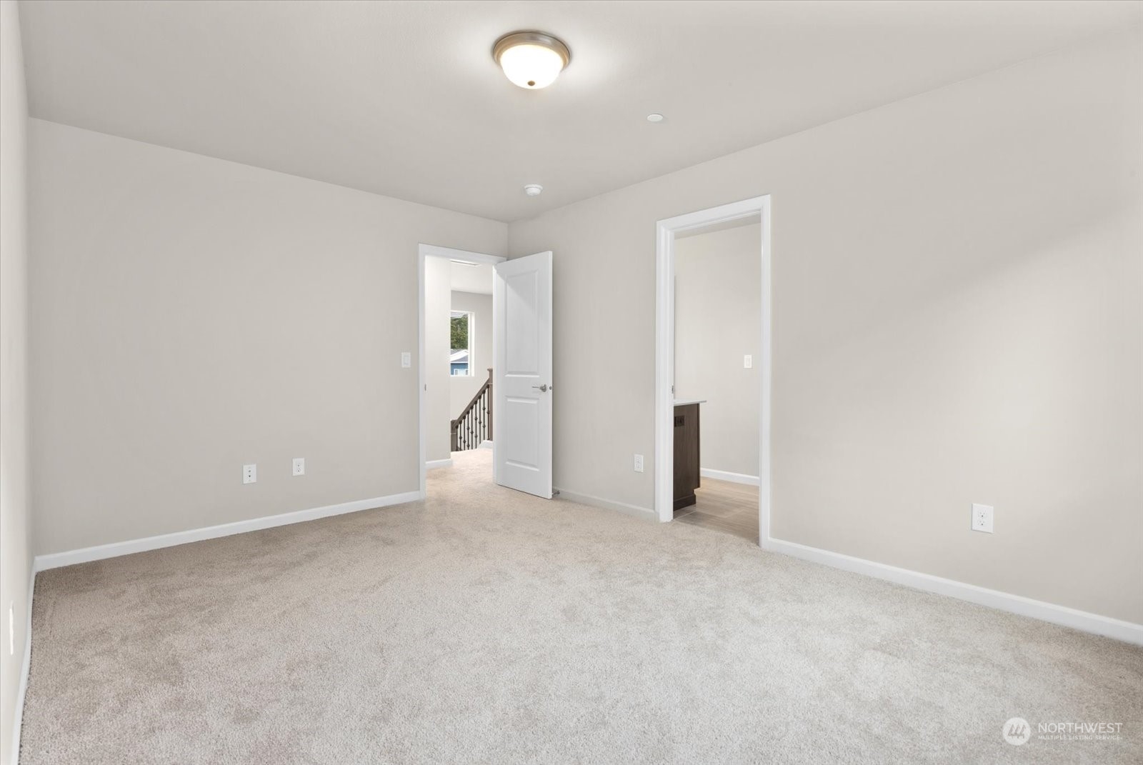 4308 233rd Place Southeast Bothell, WA 98021 - Photo 19 of 39 an empty room with an entryway