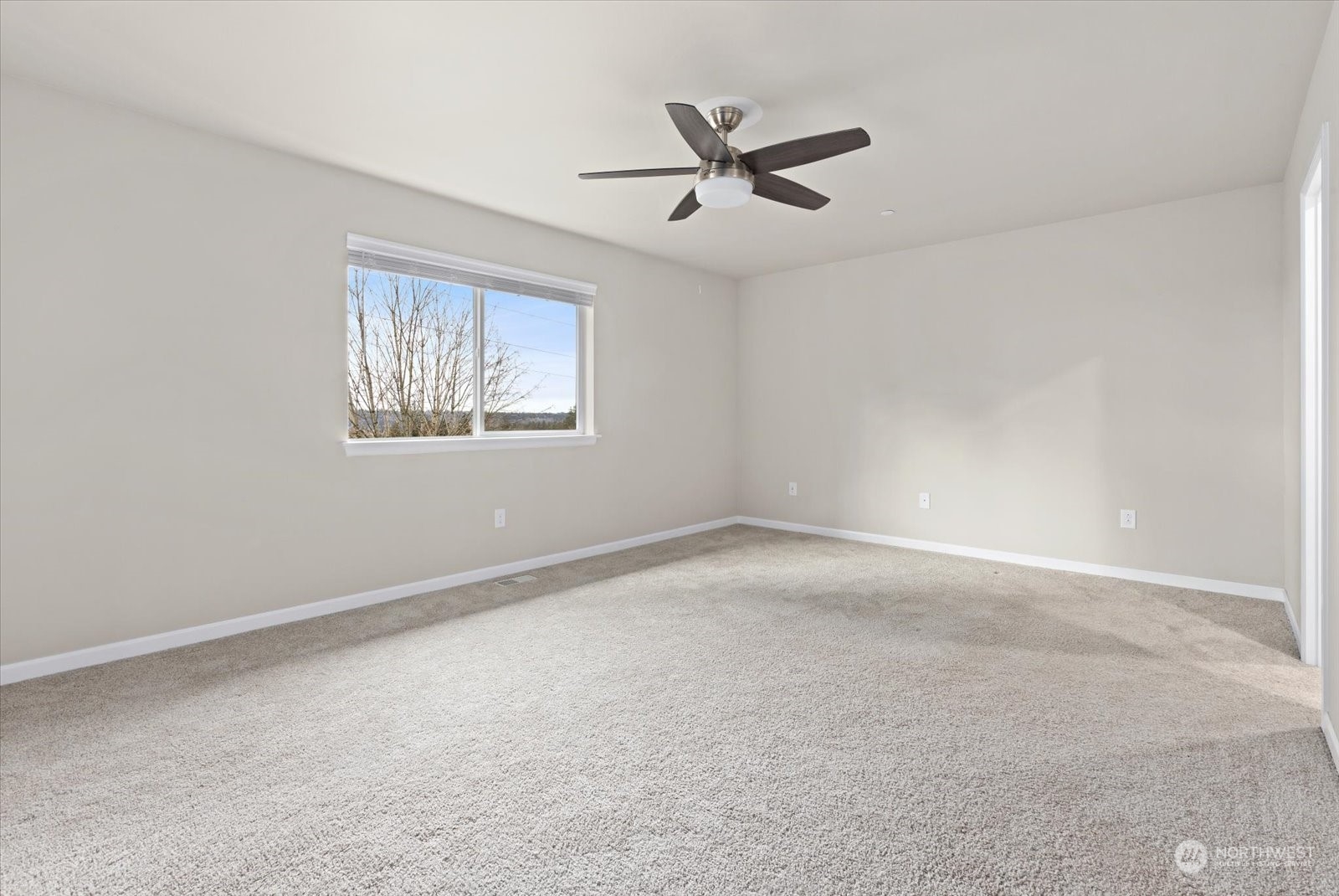 4308 233rd Place Southeast Bothell, WA 98021 - Photo 22 of 39 an empty room with a window
