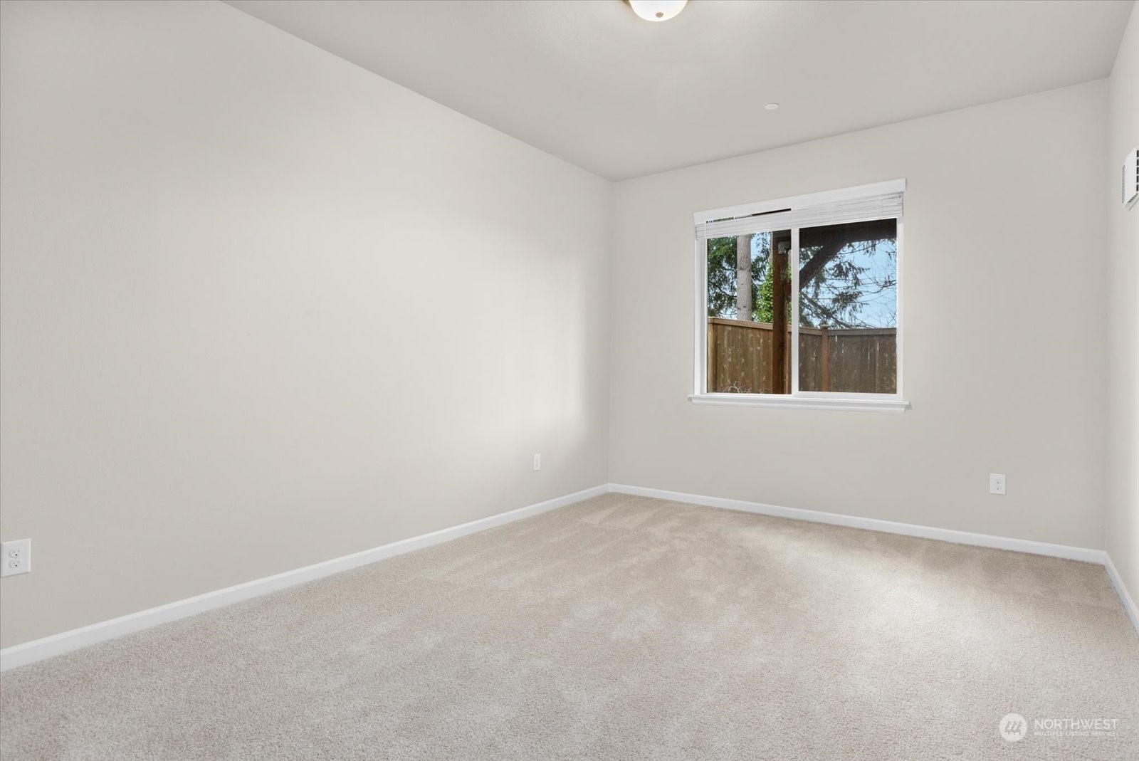 4308 233rd Place Southeast Bothell, WA 98021 - Photo 30 of 39 an empty room with a window