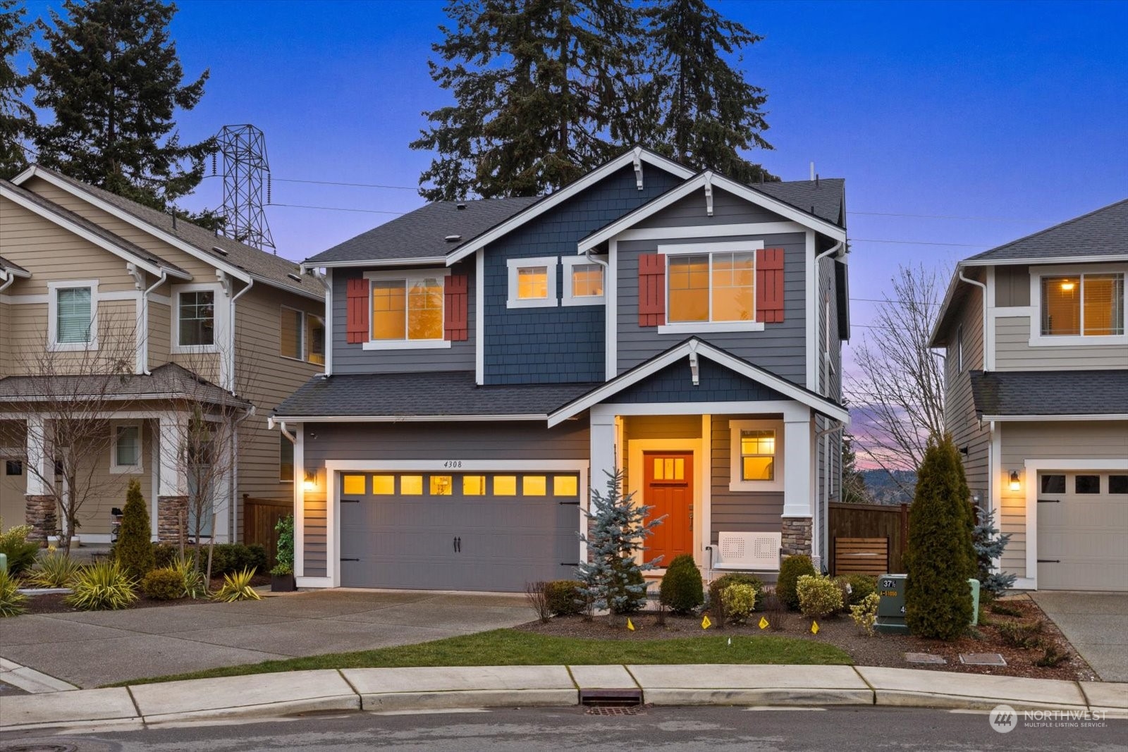 4308 233rd Place Southeast Bothell, WA 98021 - Photo 33 of 39 a front view of a house with a yard