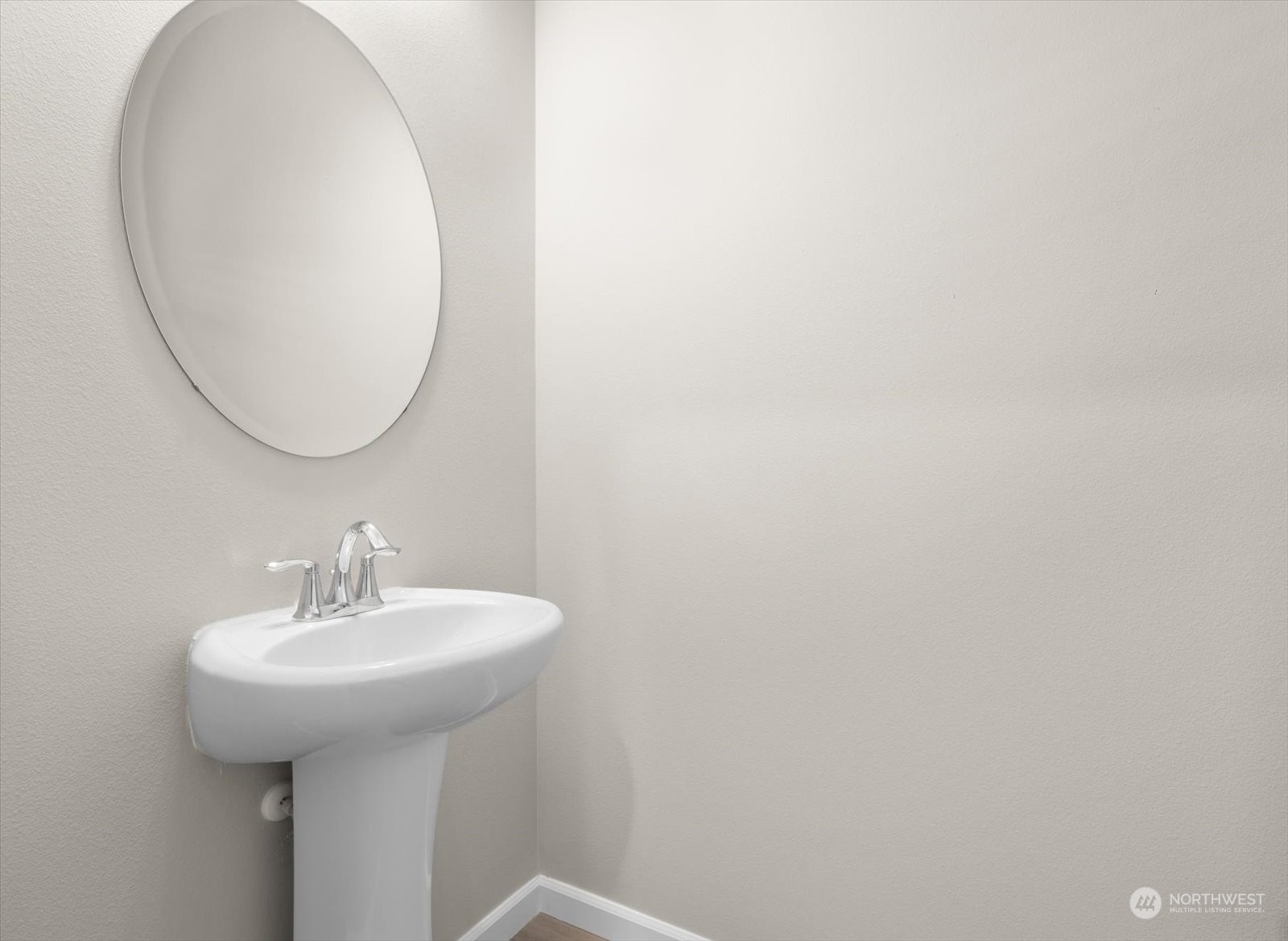 4308 233rd Place Southeast Bothell, WA 98021 - Photo 4 of 39 a bathroom with a sink and a mirror