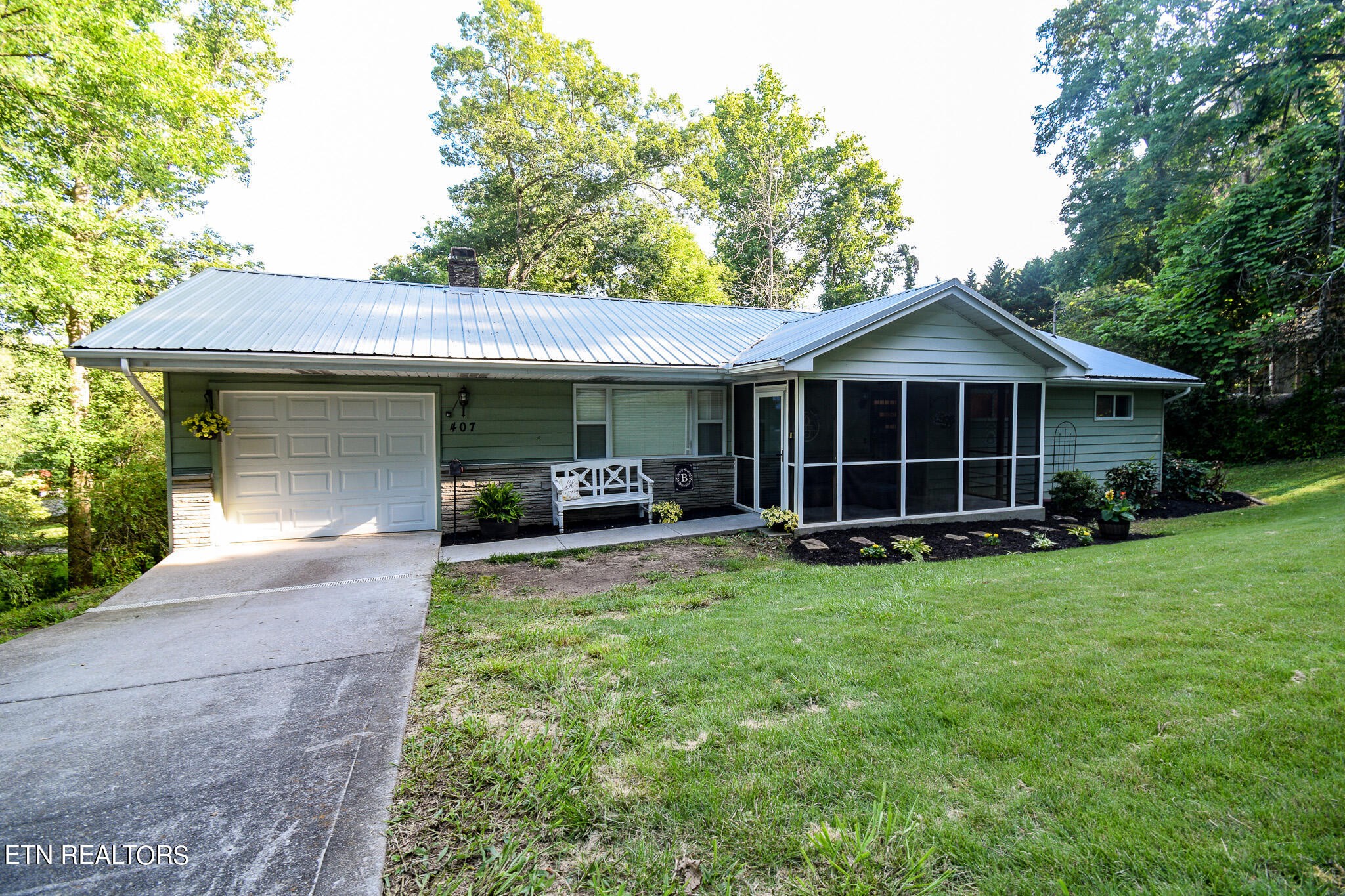 407 Delaware Avenue Oak Ridge, TN 37830 - Photo 36 of 40 a view of a house with a yard