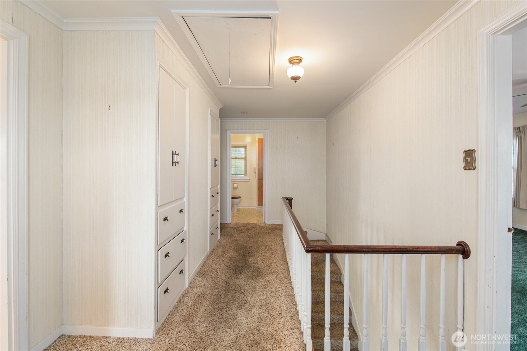 614 1st Avenue Aberdeen, WA 98520 - Photo 16 of 38 a view of a hallway with wooden floor and entryway