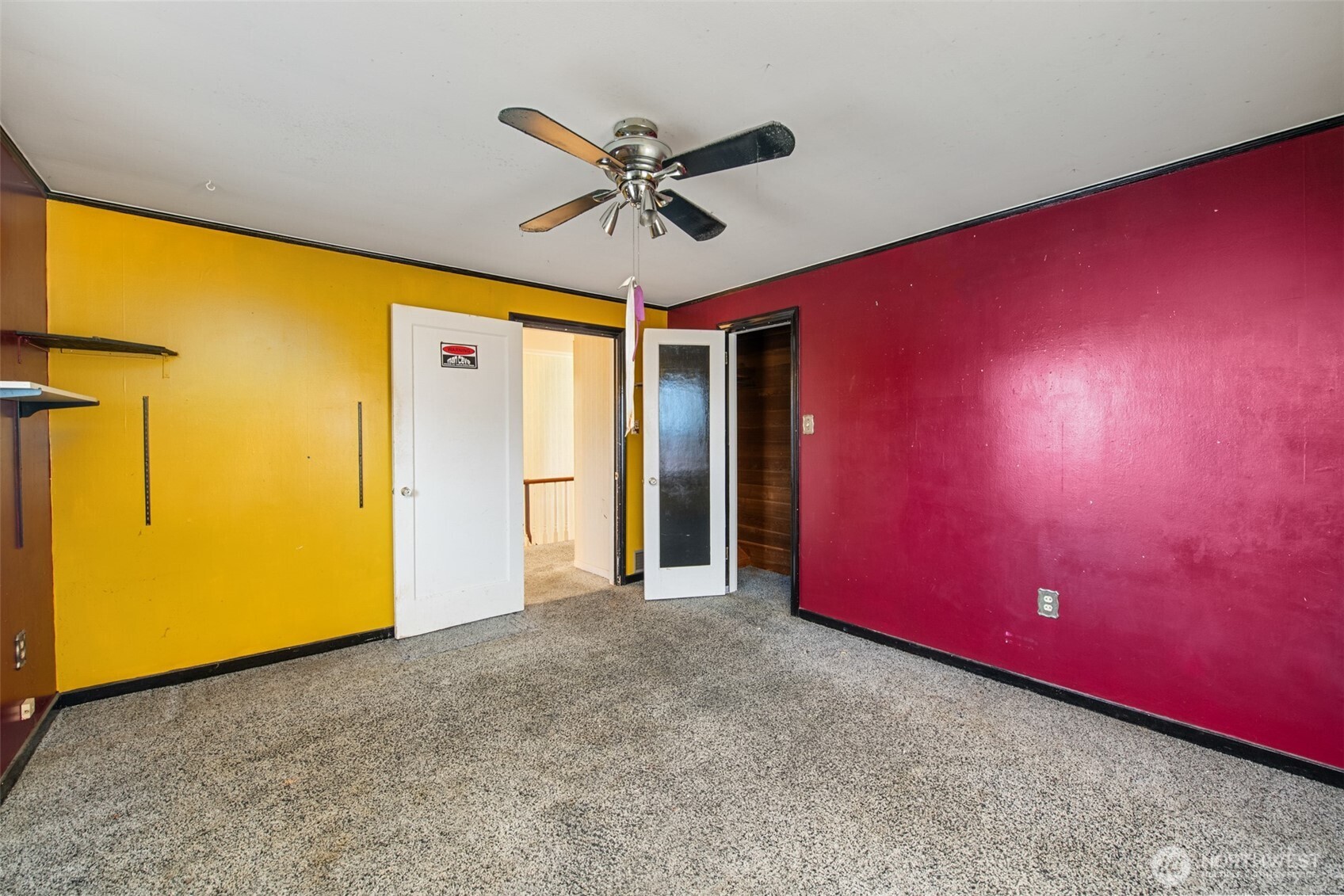 614 1st Avenue Aberdeen, WA 98520 - Photo 21 of 38 a view of a big room with wooden floor and chandelier fan