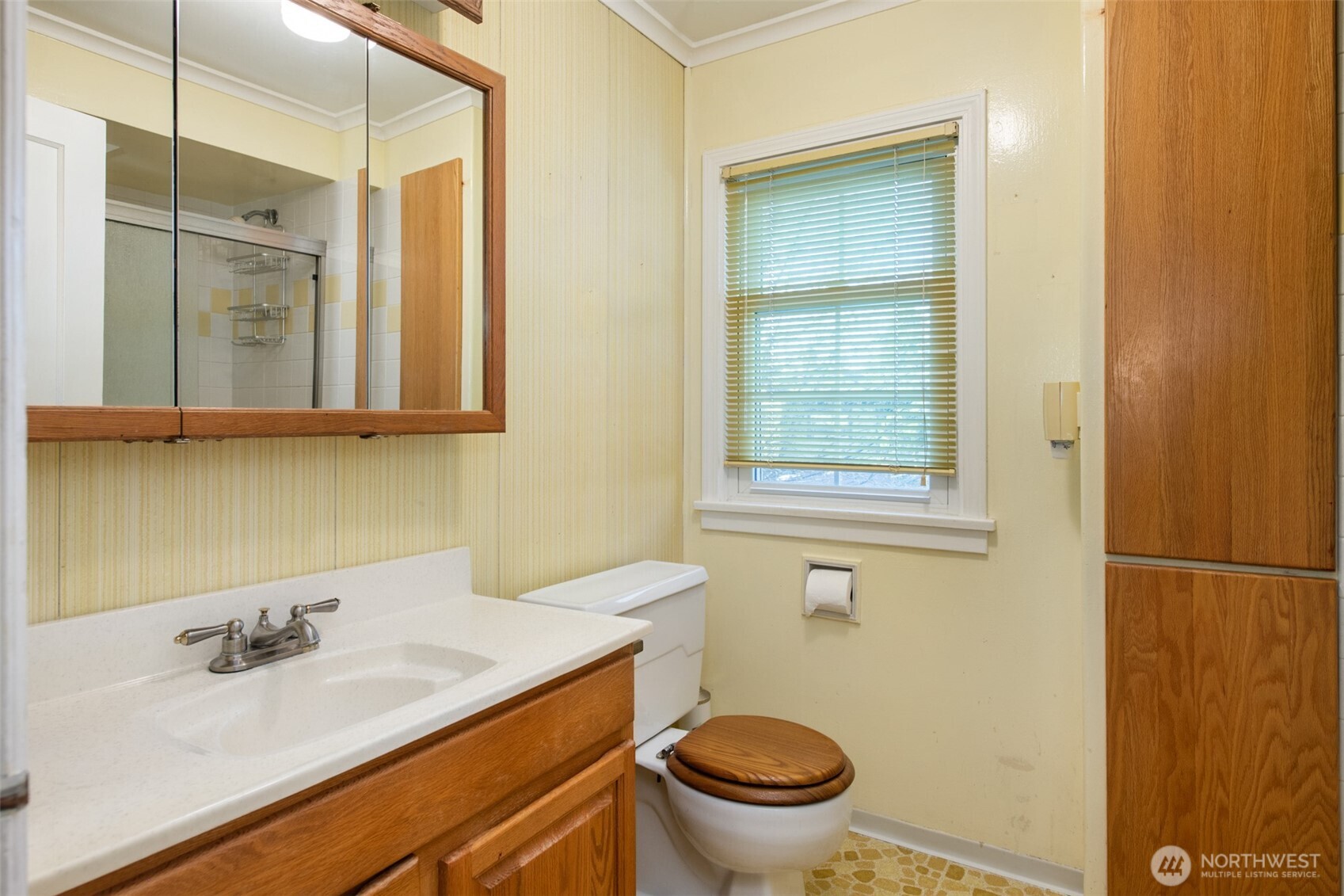 614 1st Avenue Aberdeen, WA 98520 - Photo 23 of 38 a bathroom with a granite countertop sink toilet and mirror