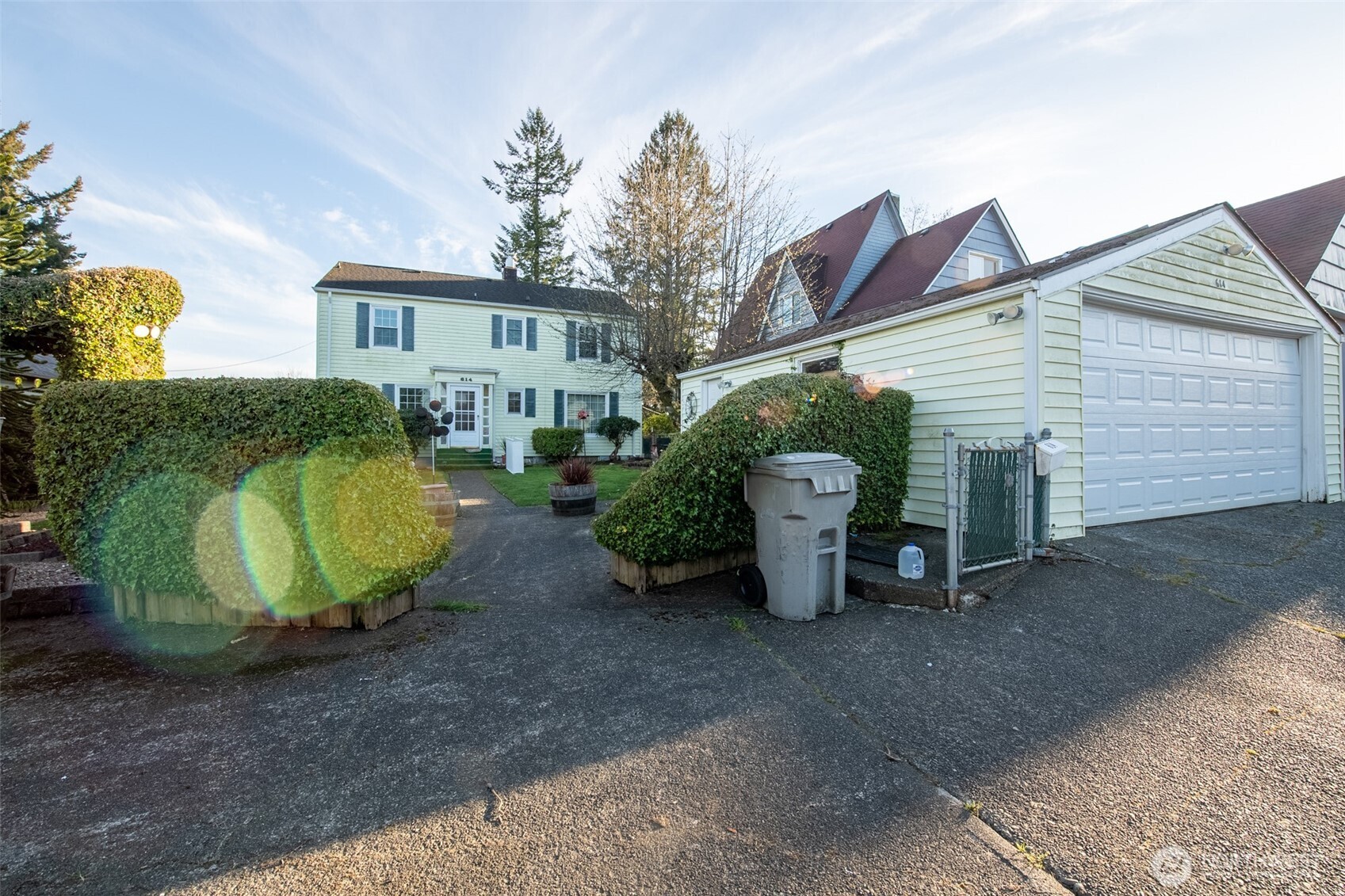 614 1st Avenue Aberdeen, WA 98520 - Photo 32 of 38 a view of a house with a yard and potted plants