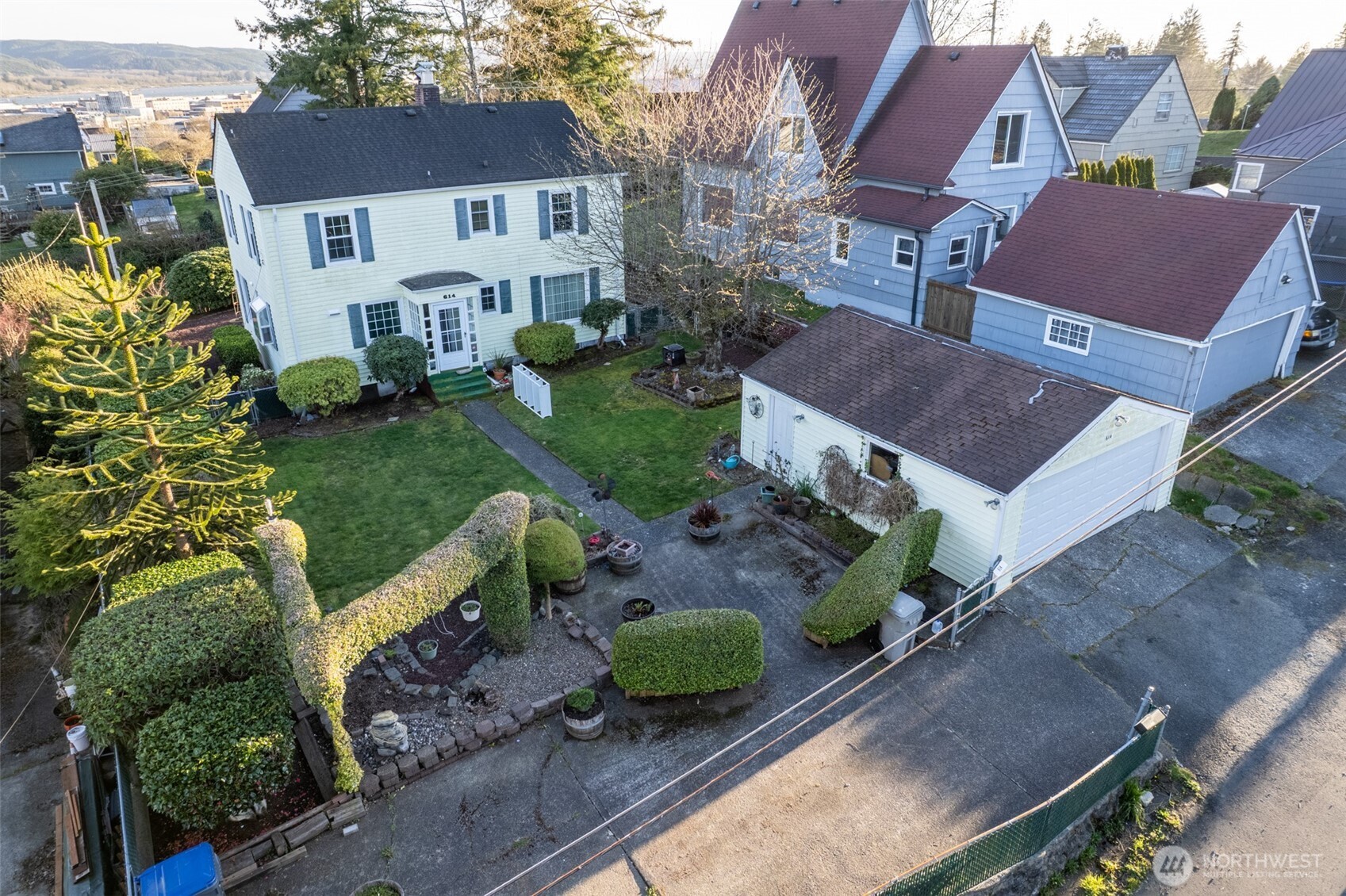614 1st Avenue Aberdeen, WA 98520 - Photo 36 of 38 an aerial view of a house with garden space and street view