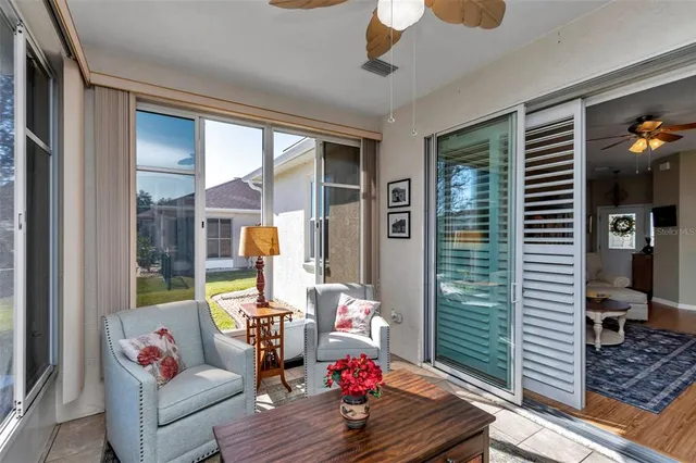 a living room with furniture and a window