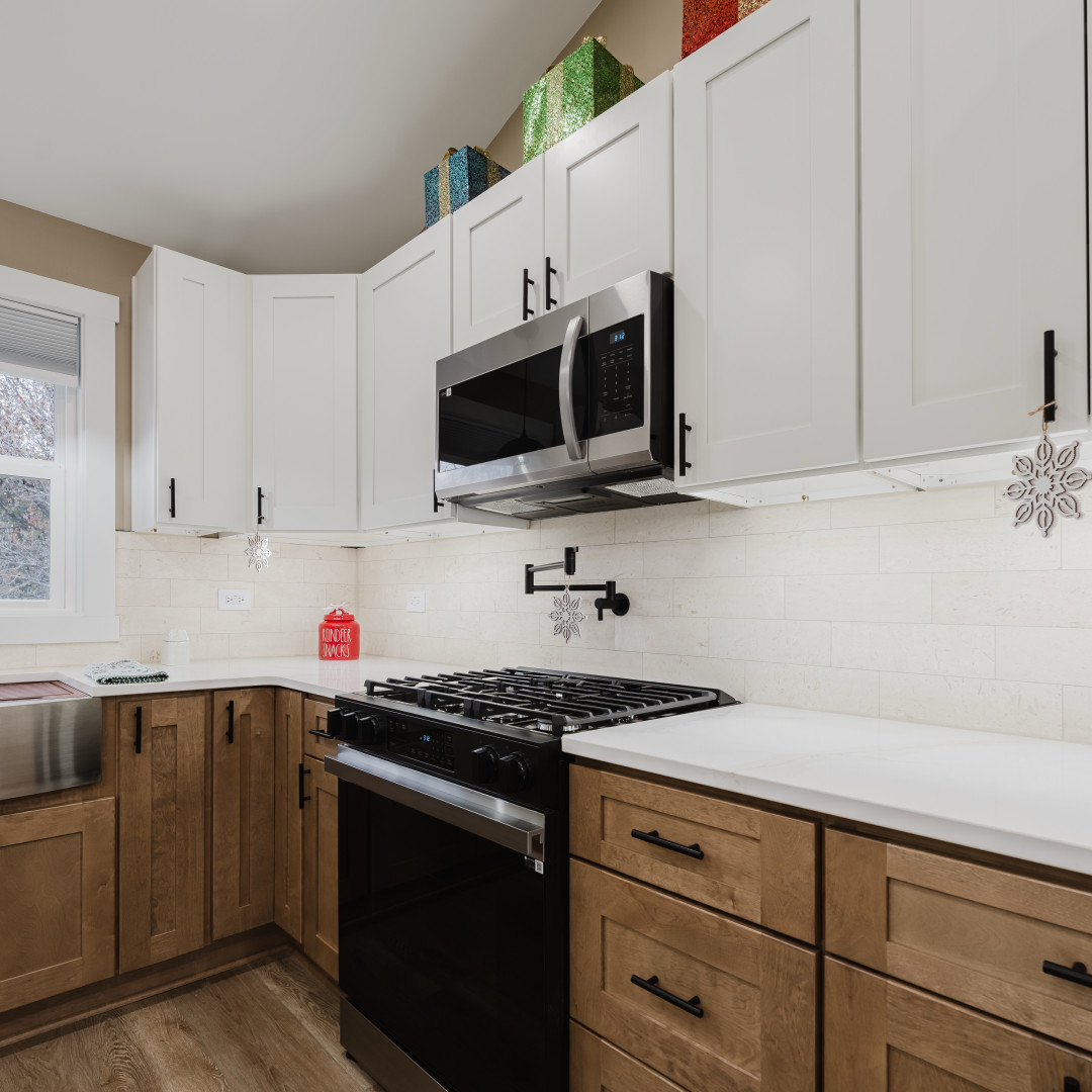 211 Roberts Road New Lenox, IL 60451 - Photo 13 of 37 a kitchen with stainless steel appliances a sink dishwasher stove microwave and cabinets