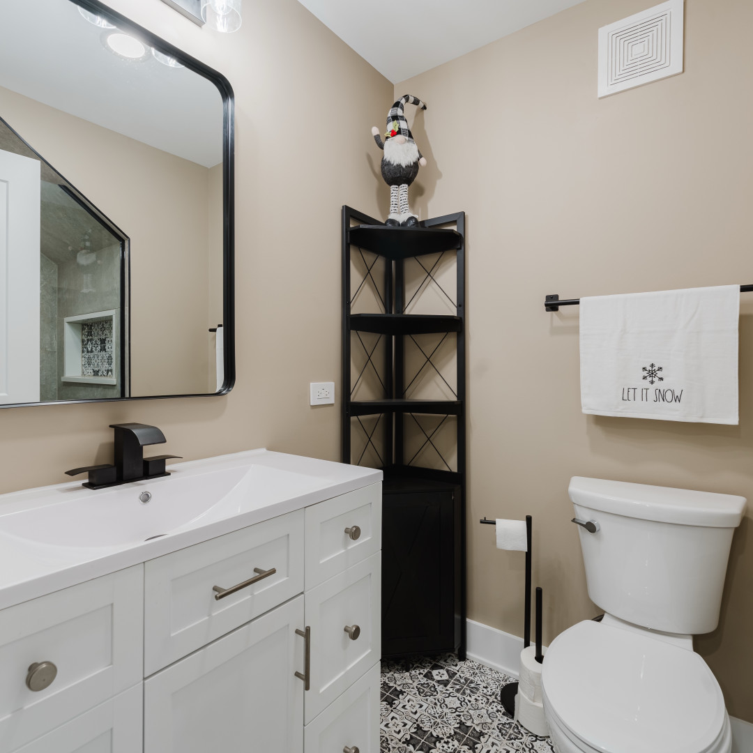 211 Roberts Road New Lenox, IL 60451 - Photo 30 of 37 a bathroom with a toilet sink and mirror