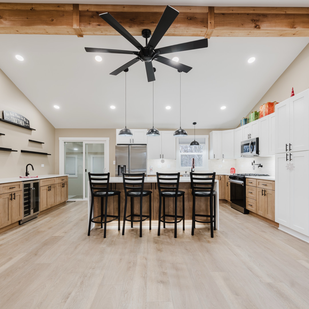 211 Roberts Road New Lenox, IL 60451 - Photo 7 of 37 a large kitchen with a table and chairs