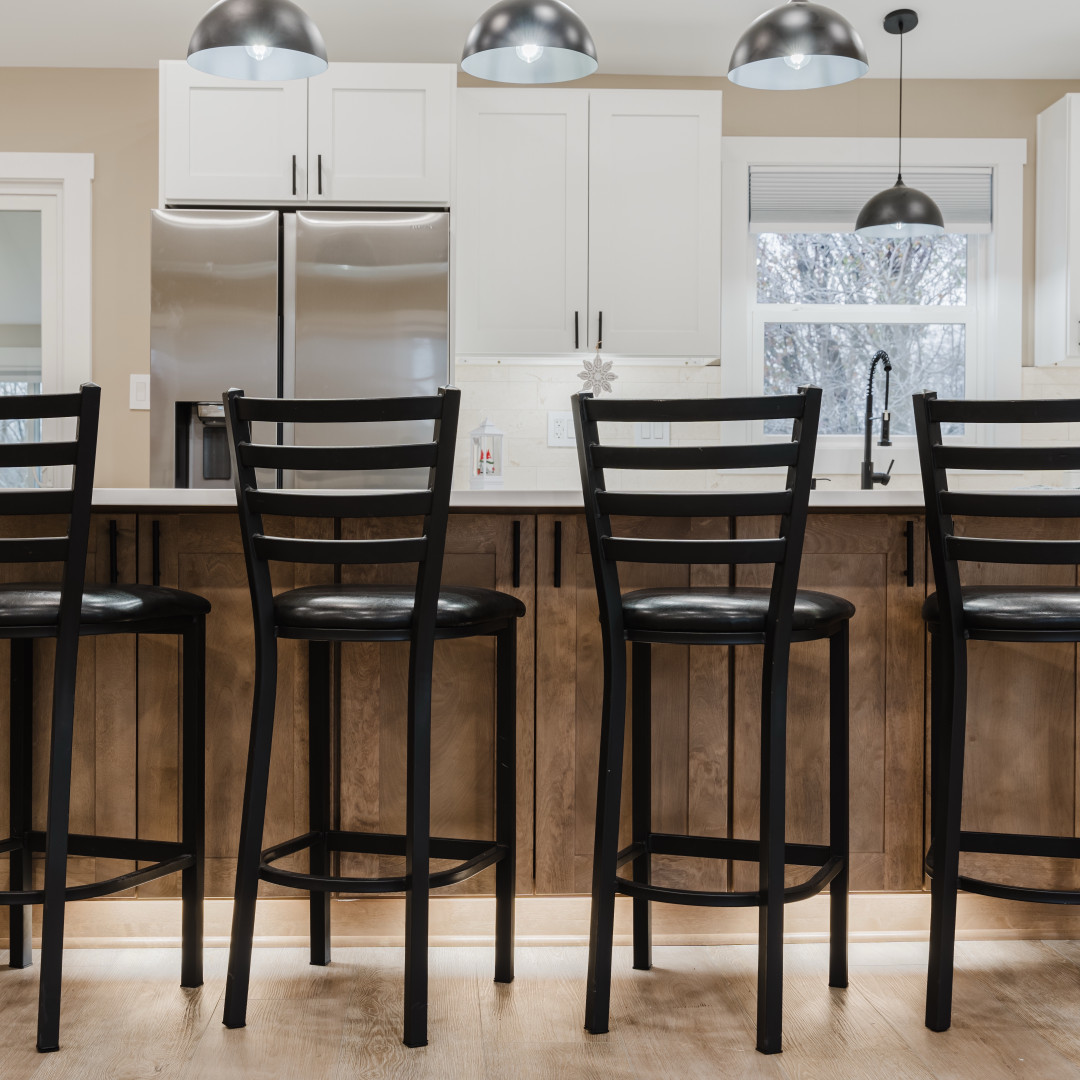 211 Roberts Road New Lenox, IL 60451 - Photo 9 of 37 a kitchen with a table chairs and refrigerator