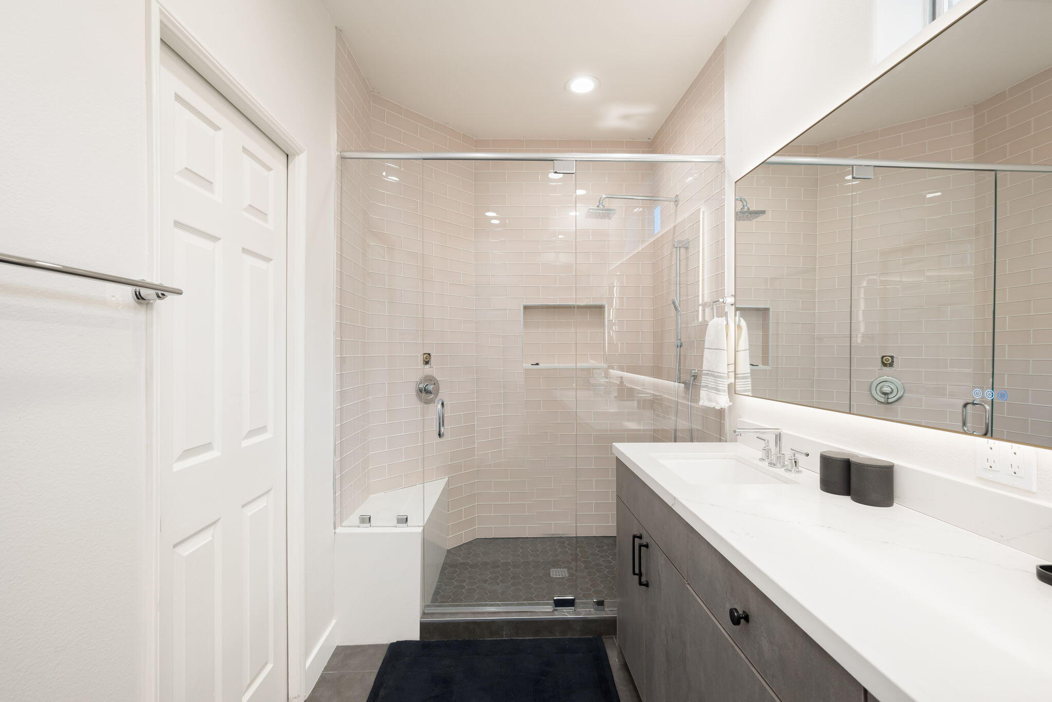 45809 Crosswater Street Indio, CA 92201 - Photo 42 of 48 a bathroom with a sink a shower and a mirror