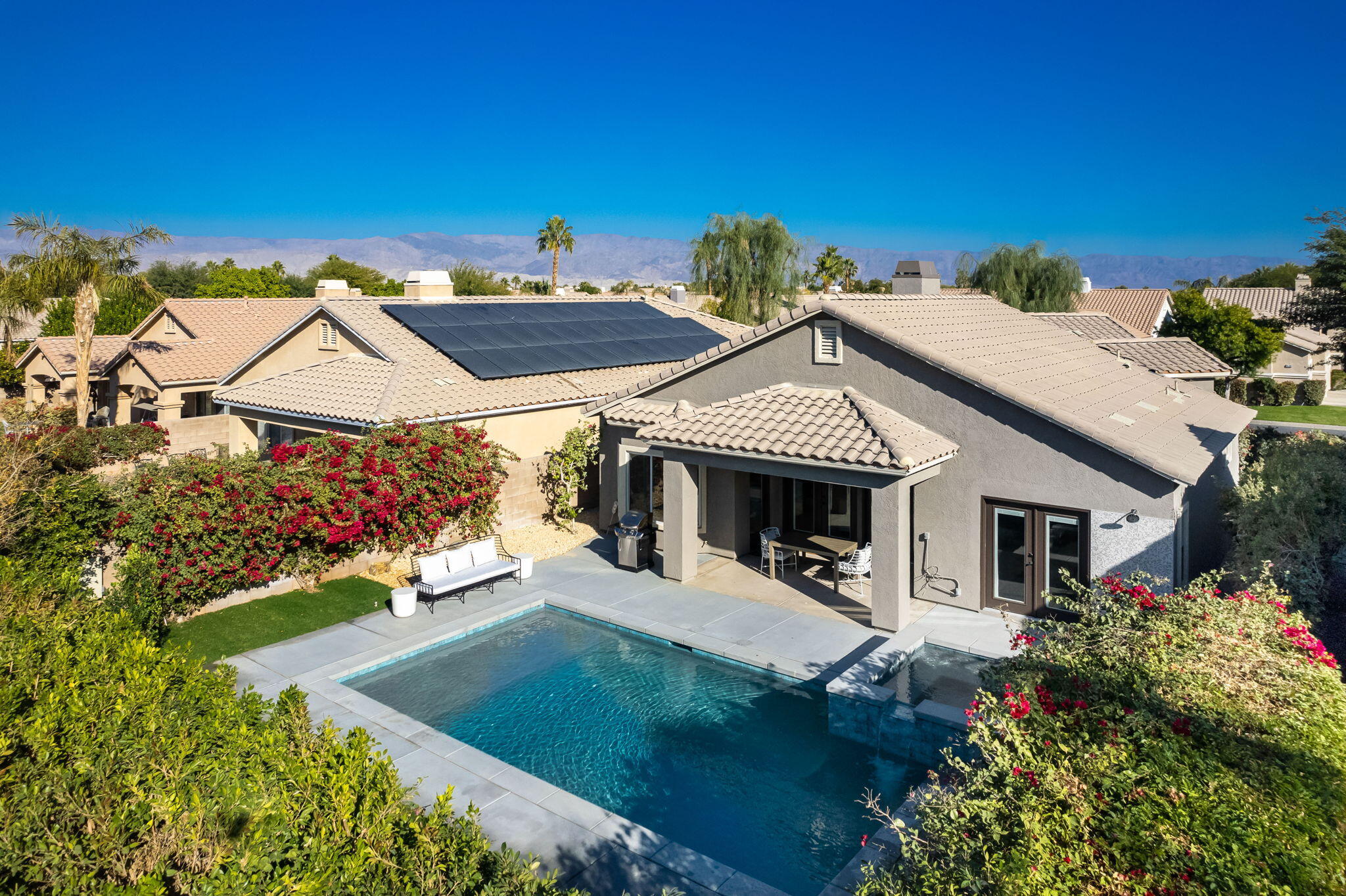 45809 Crosswater Street Indio, CA 92201 - Photo 6 of 48 a front view of a house with a yard