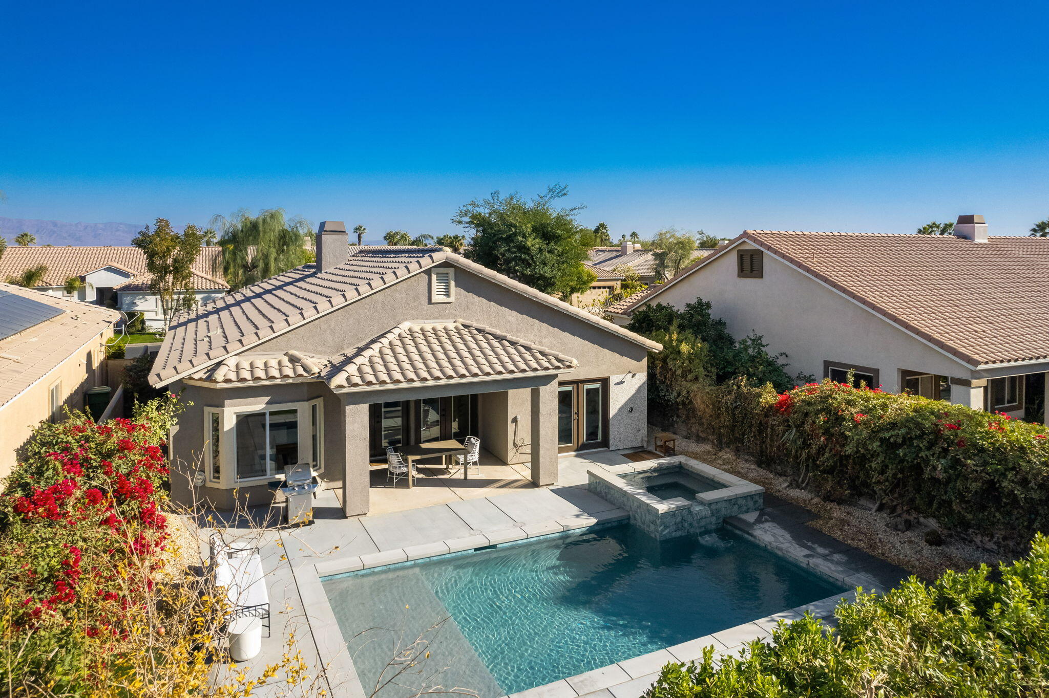 45809 Crosswater Street Indio, CA 92201 - Photo 7 of 48 front view of a house with a porch